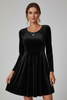 Women’s mini dress with round neckline and long sleeves